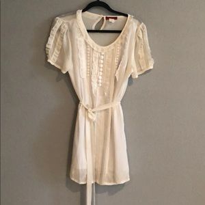Beautiful white mini dress with embellishments